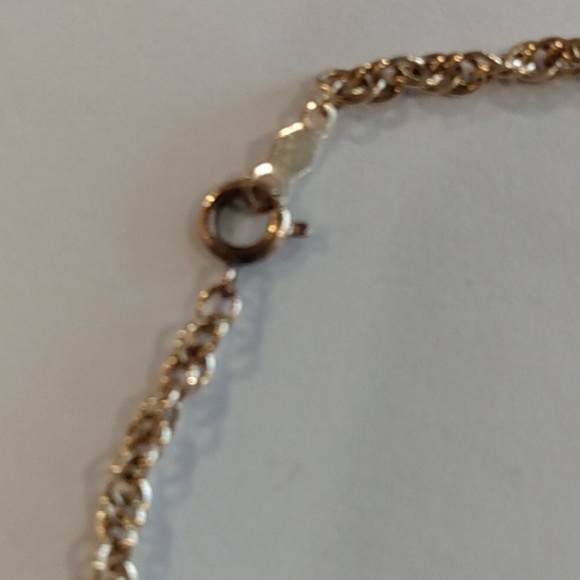 Beautiful 14 karat gold chain and lock it that opens for pictures if you choose. - Picture 5 of 6